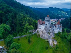 Scenic airplane flight with guests over Bran Castle